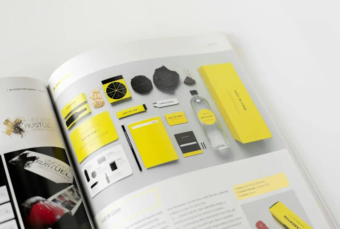 A brand guidelines book open on a spread