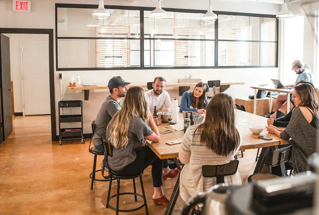A team working across a long table